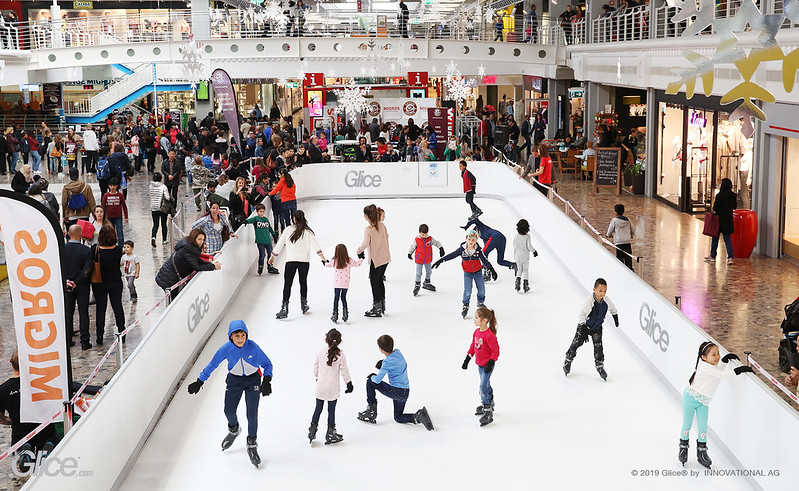 Kids skating at a shopping mall