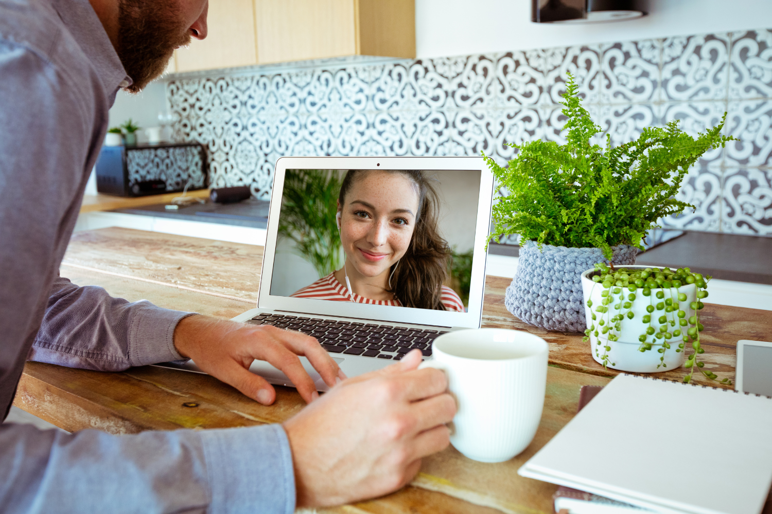 Remote team leader speaking to a remote employee.