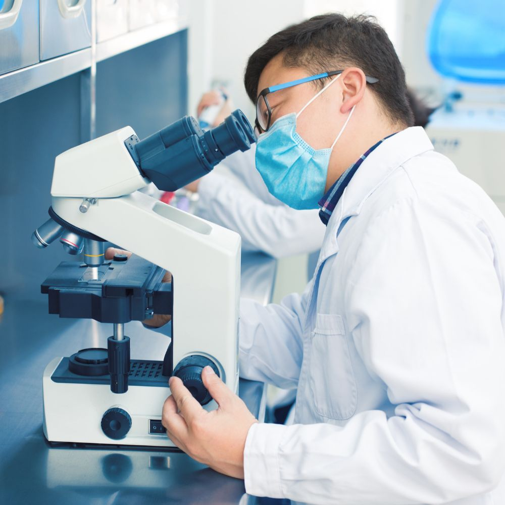 A scientist in a lab researching nerve support supplements