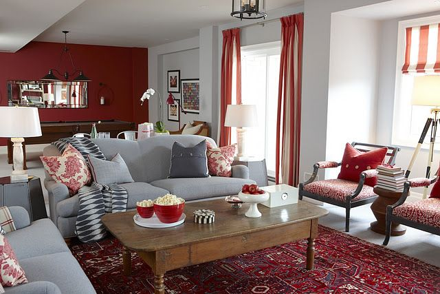 Red Accent Wall with Gray Sofa