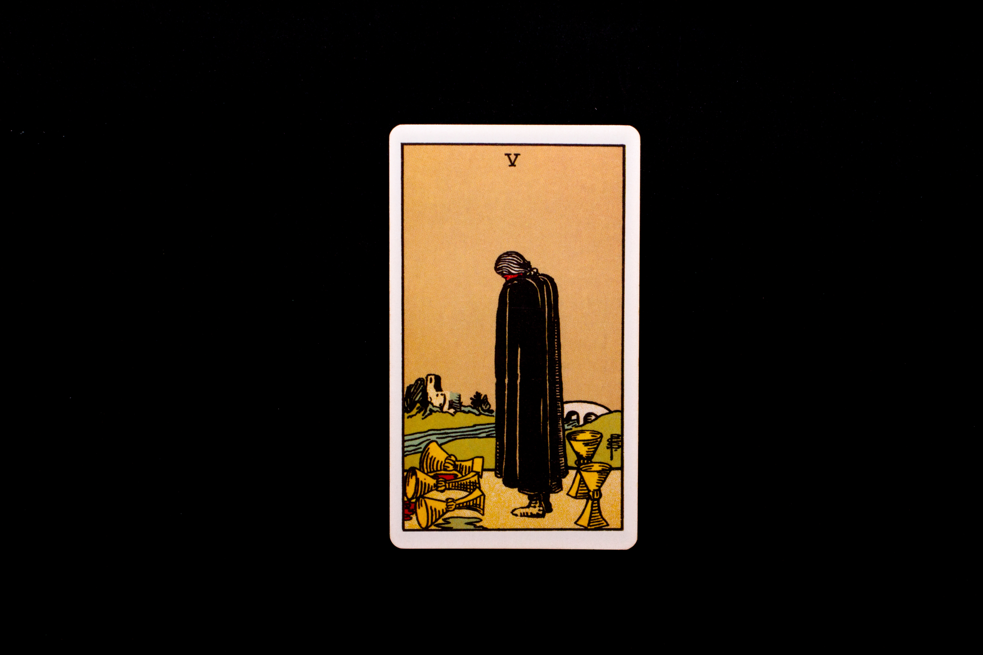 Five of cups card meanings are mixed depending on what direction you are facing.