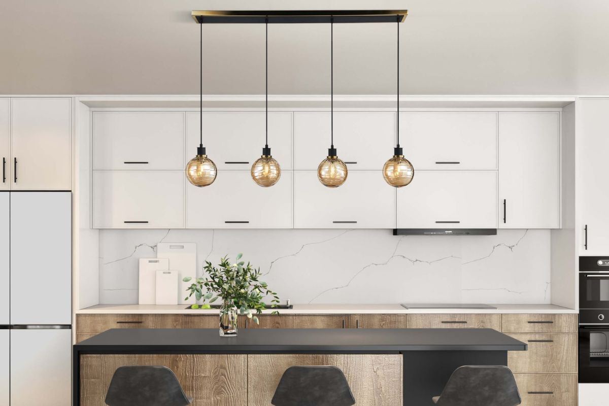 Modern Gem 4-light ceiling light fixtures over a kitchen island, adding warm glow and style to the room.