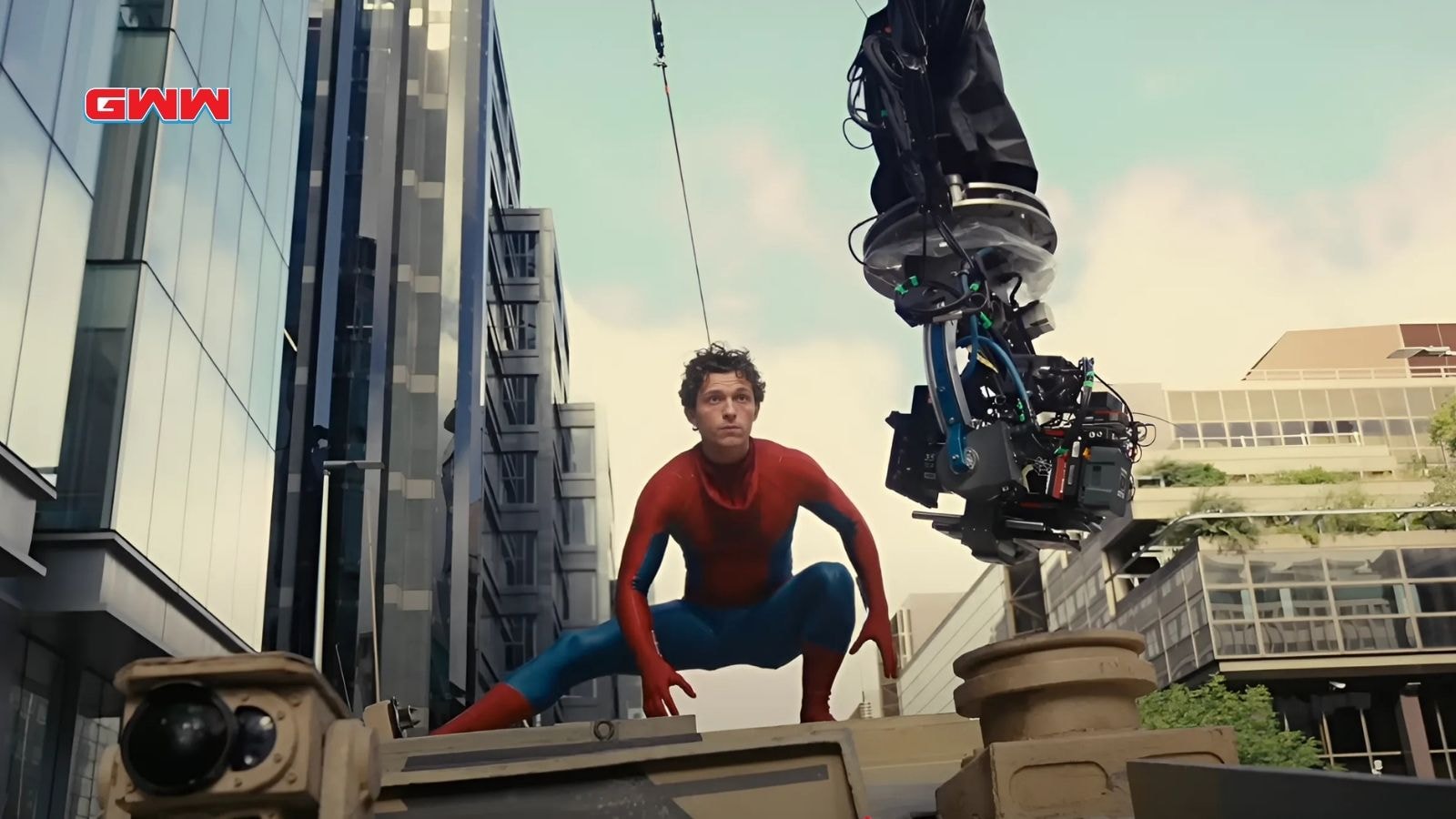 Tom Holland as Spiderman on top of tank BTS in Spider-Man: Brand New Day