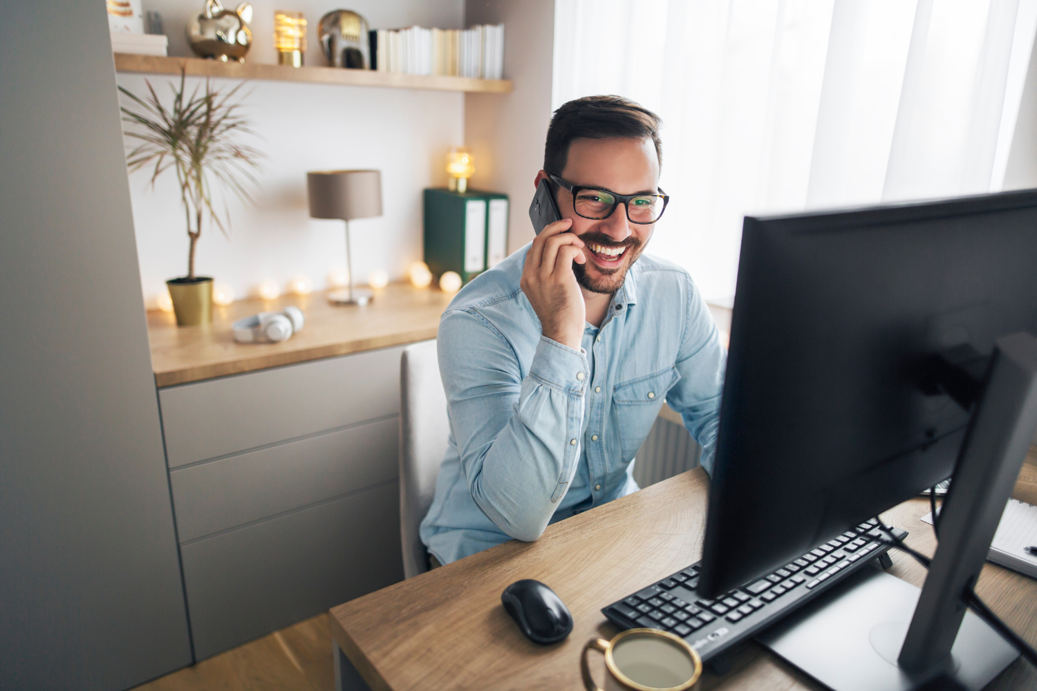 Remote team member working on his computer.