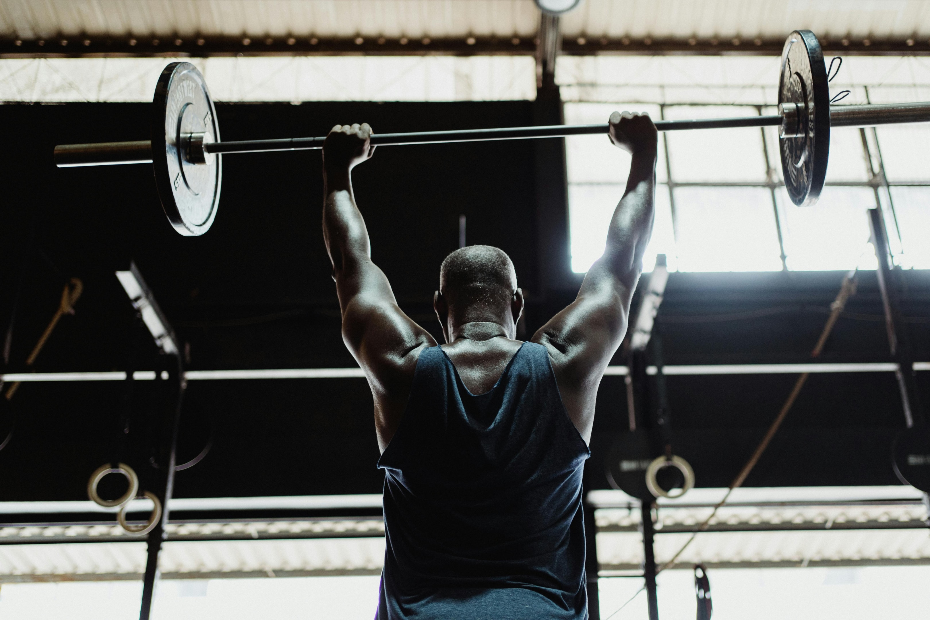 Photo by Ketut Subiyanto: https://www.pexels.com/photo/muscular-man-lifting-barbell-4720780/