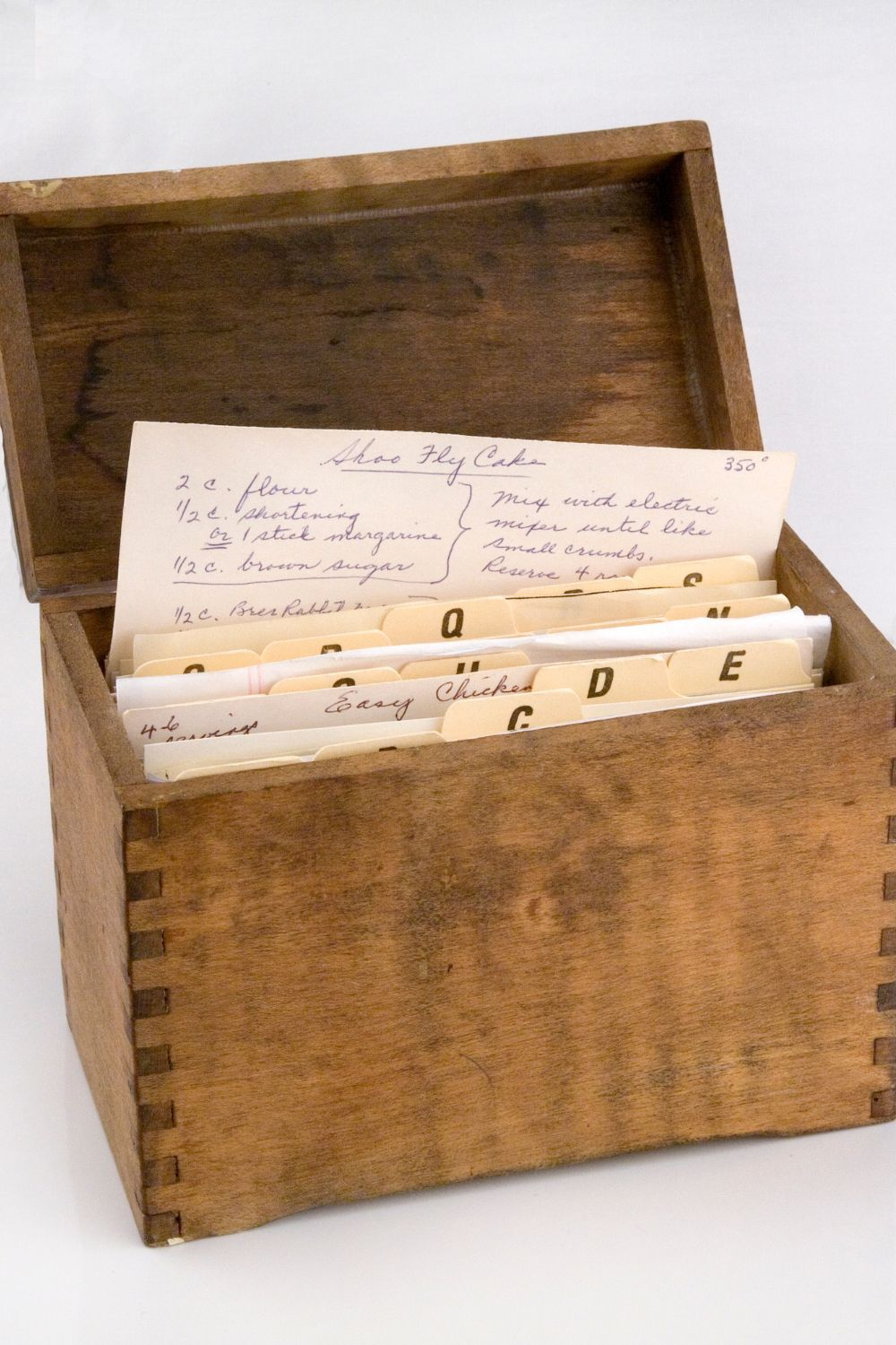 wooden recipe box filled with old recipes