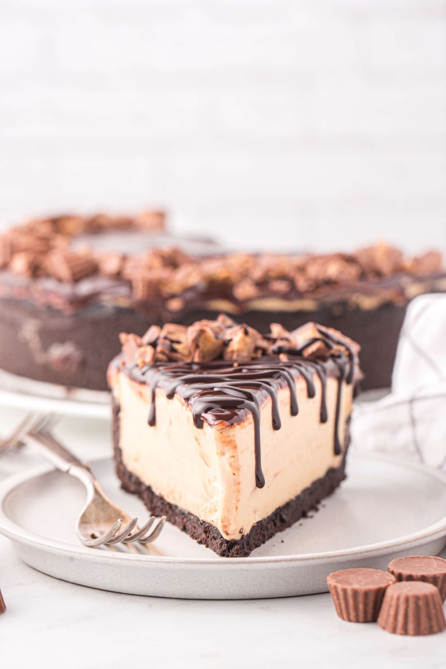 slice of no bake peanut butter cheesecake on a plate