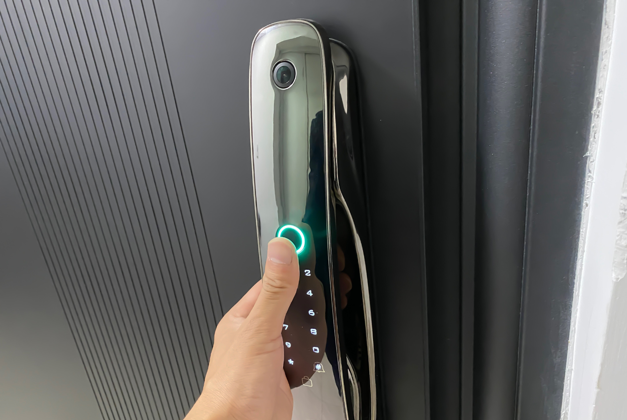 Futuristic smart lock with thumbprint scanner.