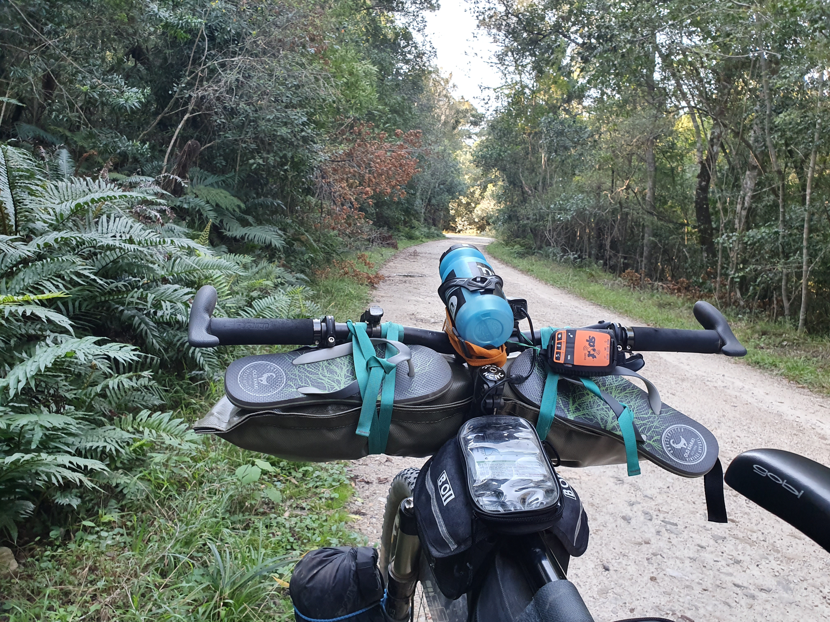 Top Tube  bikepacking frame bag in use with Mobile phone clear bag 