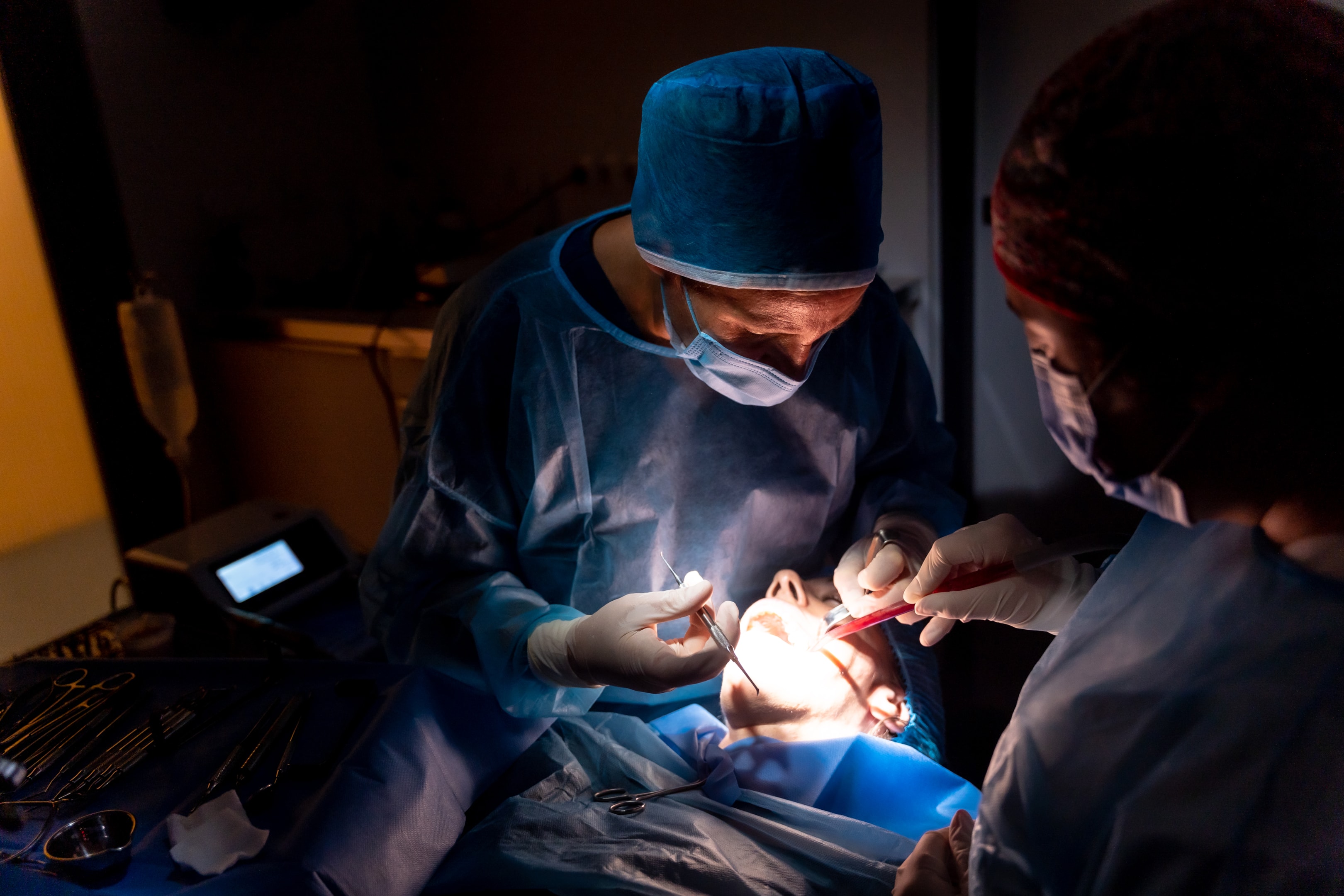 Oral surgeon during chin lower jaw surgery