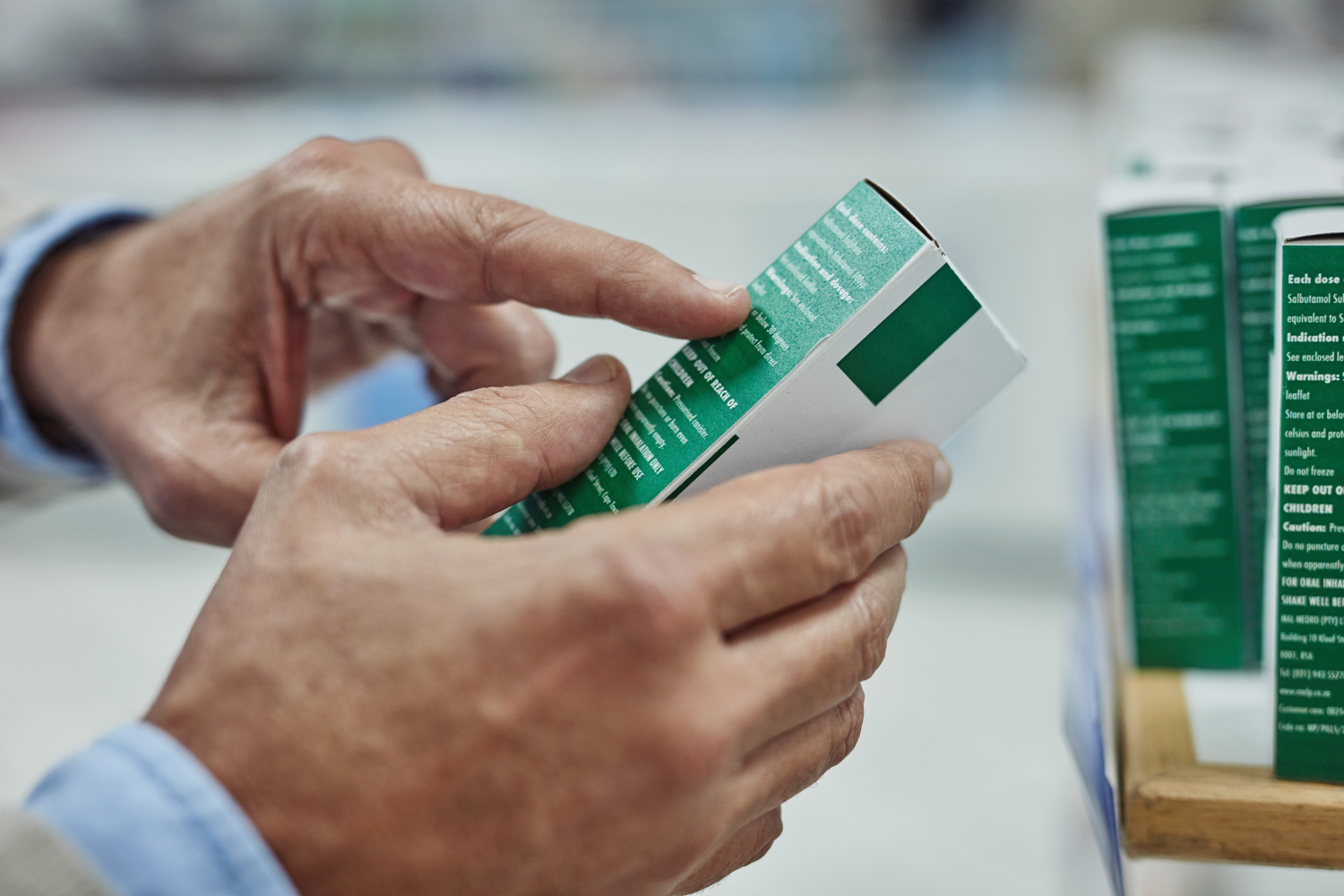 Person looking at a product packaging.