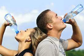 Photo of people staying hydrated in high heat index conditions