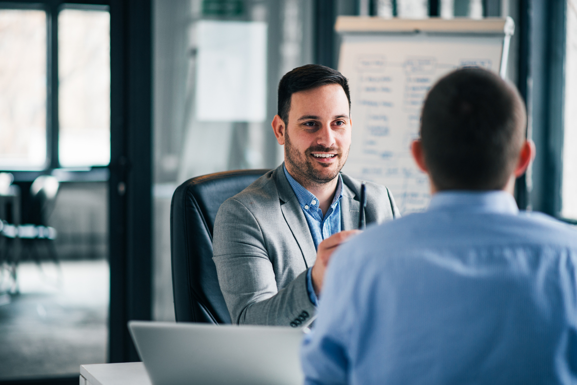 Business owner discussing a supplement business plan with a mentor