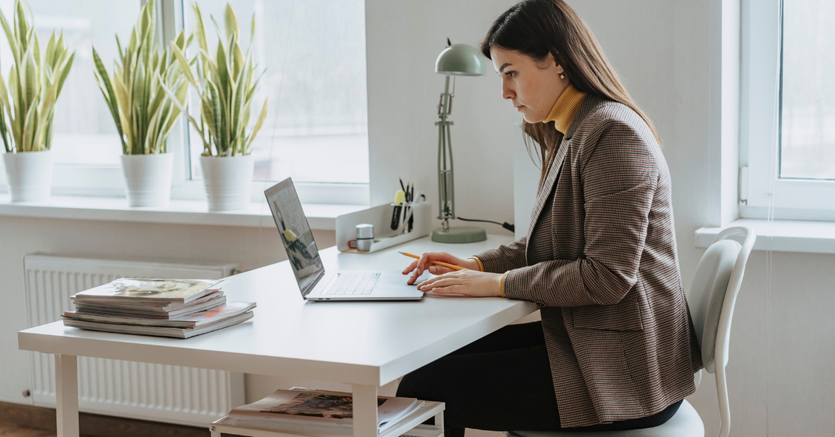 Tax credits for self-employed woman planning quarterly tax payments.