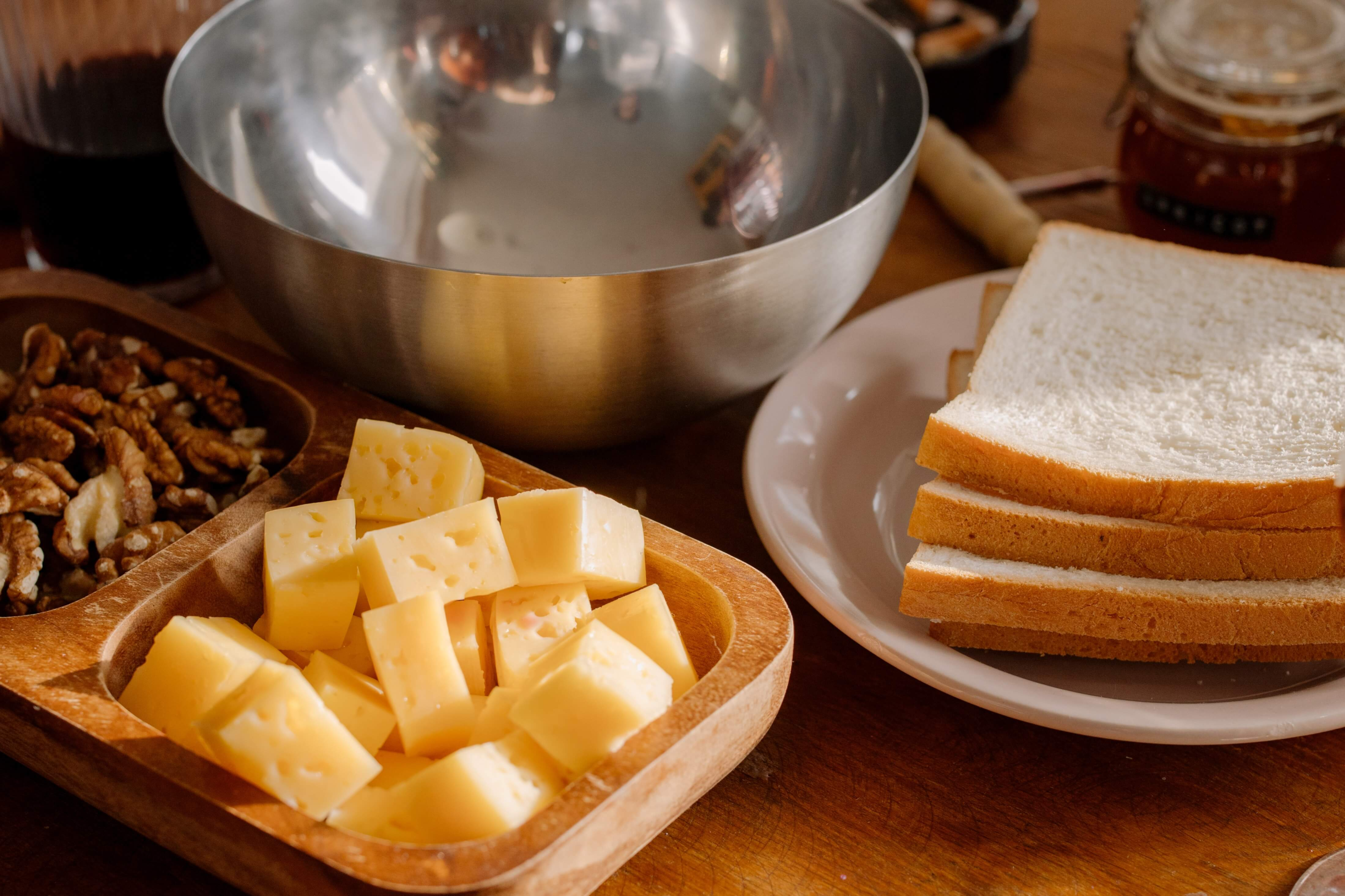 sliced cheese and bread on the plate