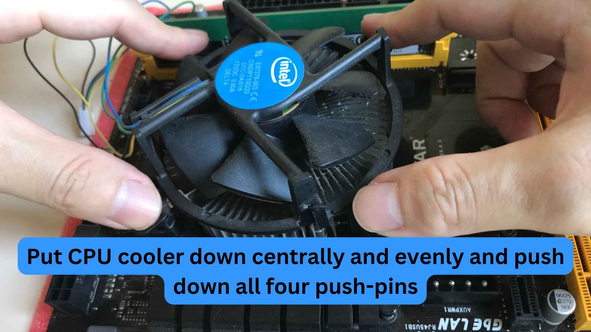 Push all four pins down to secure heatsink