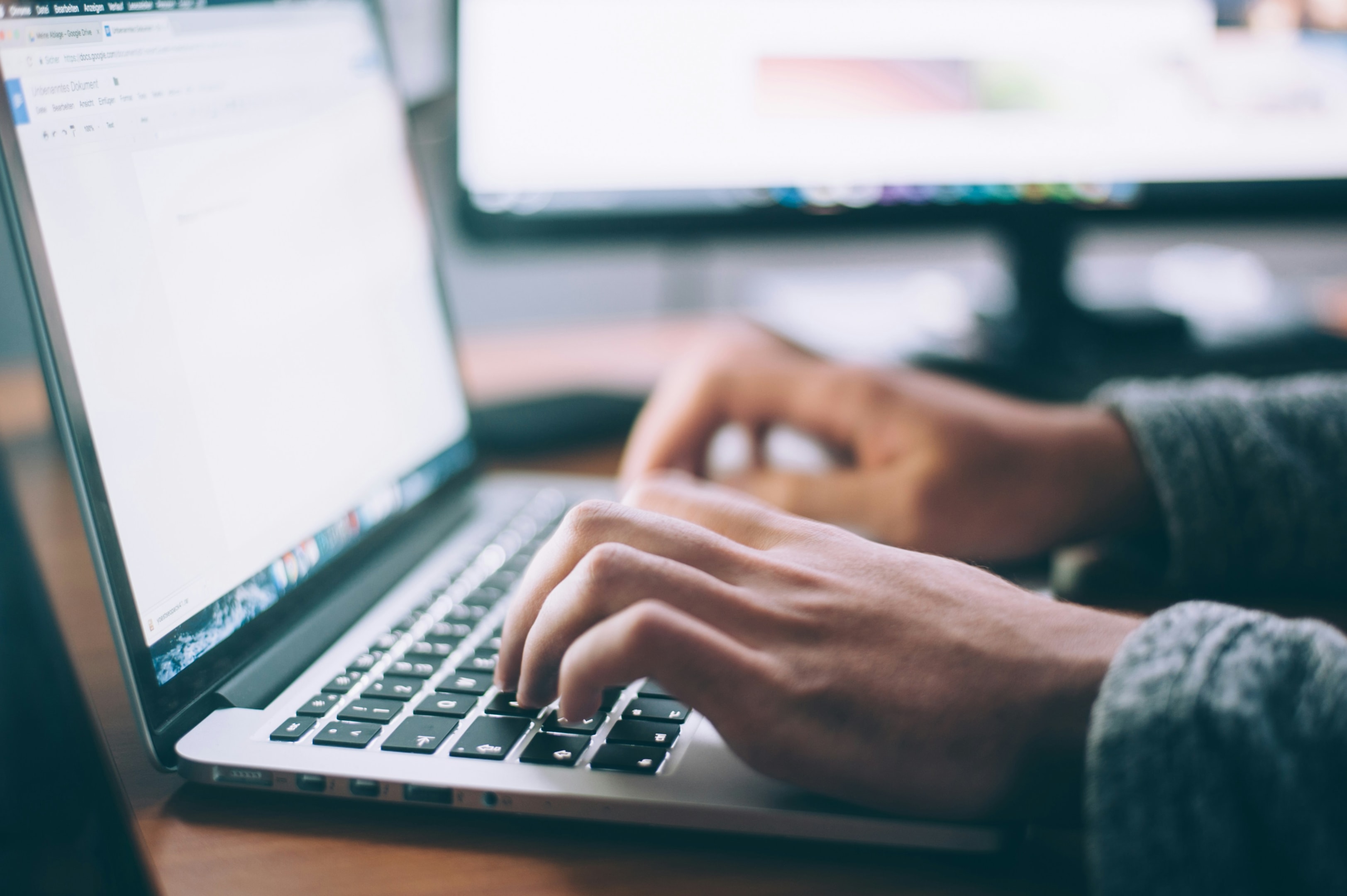 Real estate investor researches online marketing strategies.
