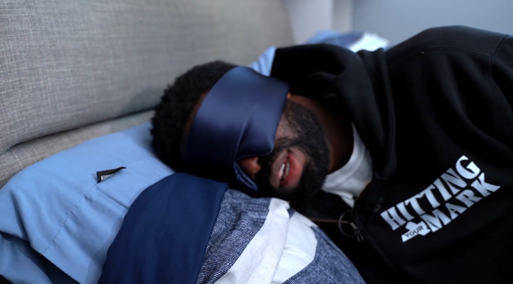 trying the drowsy sleep mask in the bed