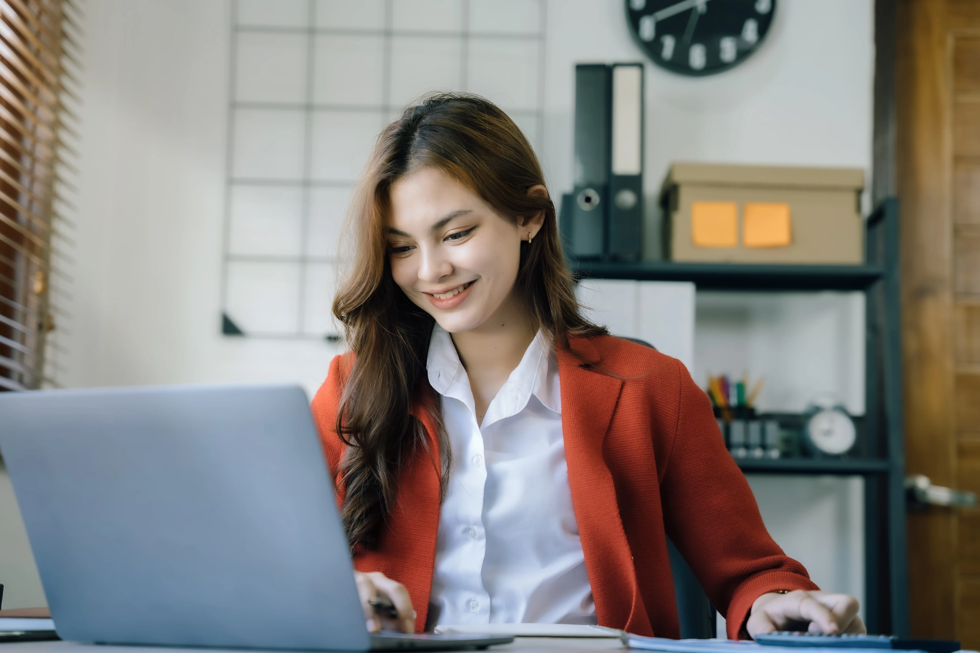 A team of real estate agents working together in a real estate office