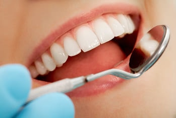 dental implant, traditional dental bridge consists