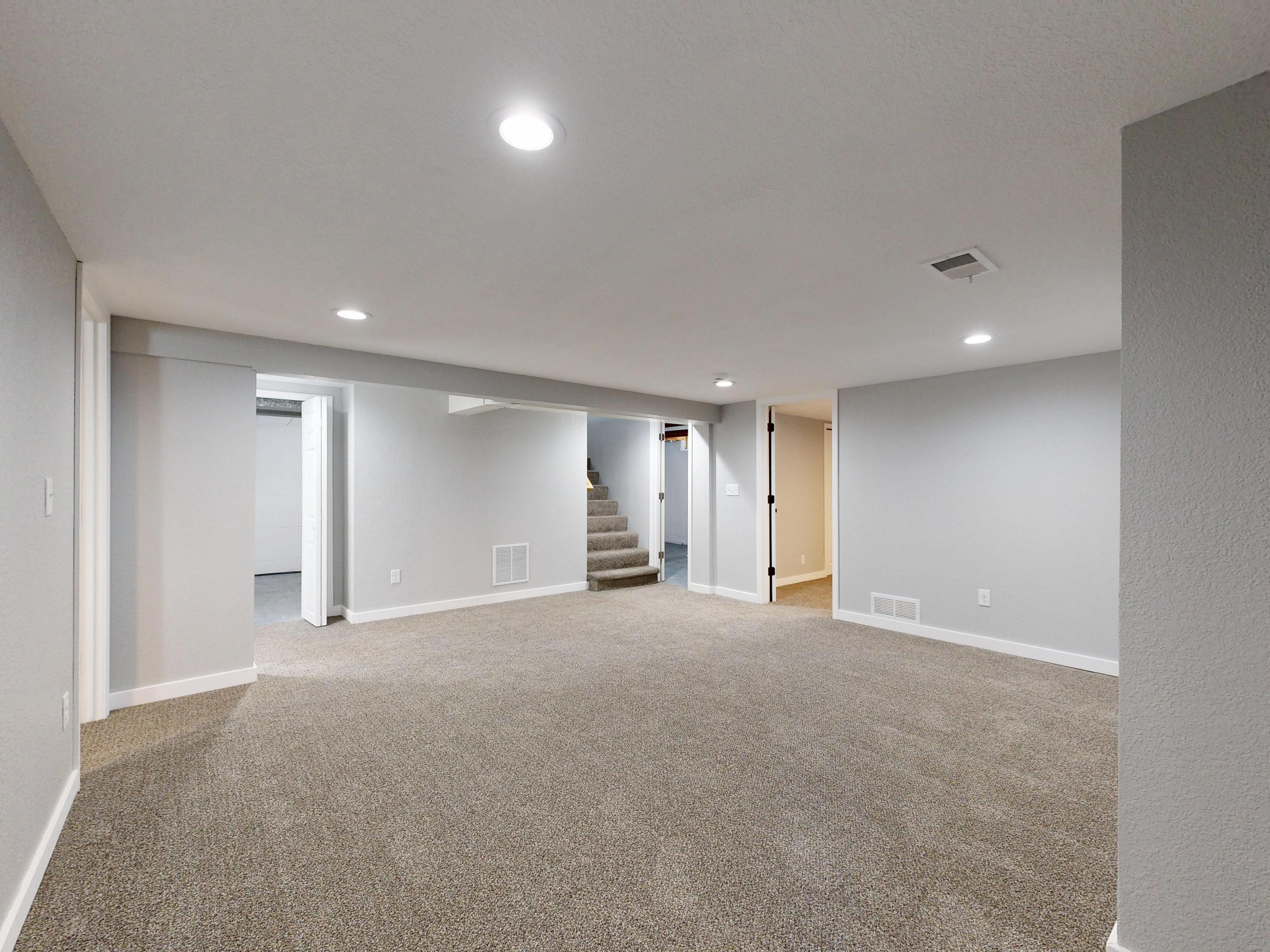 Finished basement with carpet