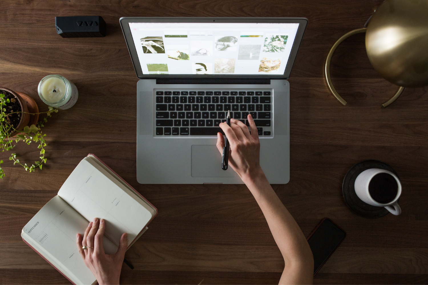 Top view of a person using a laptop.