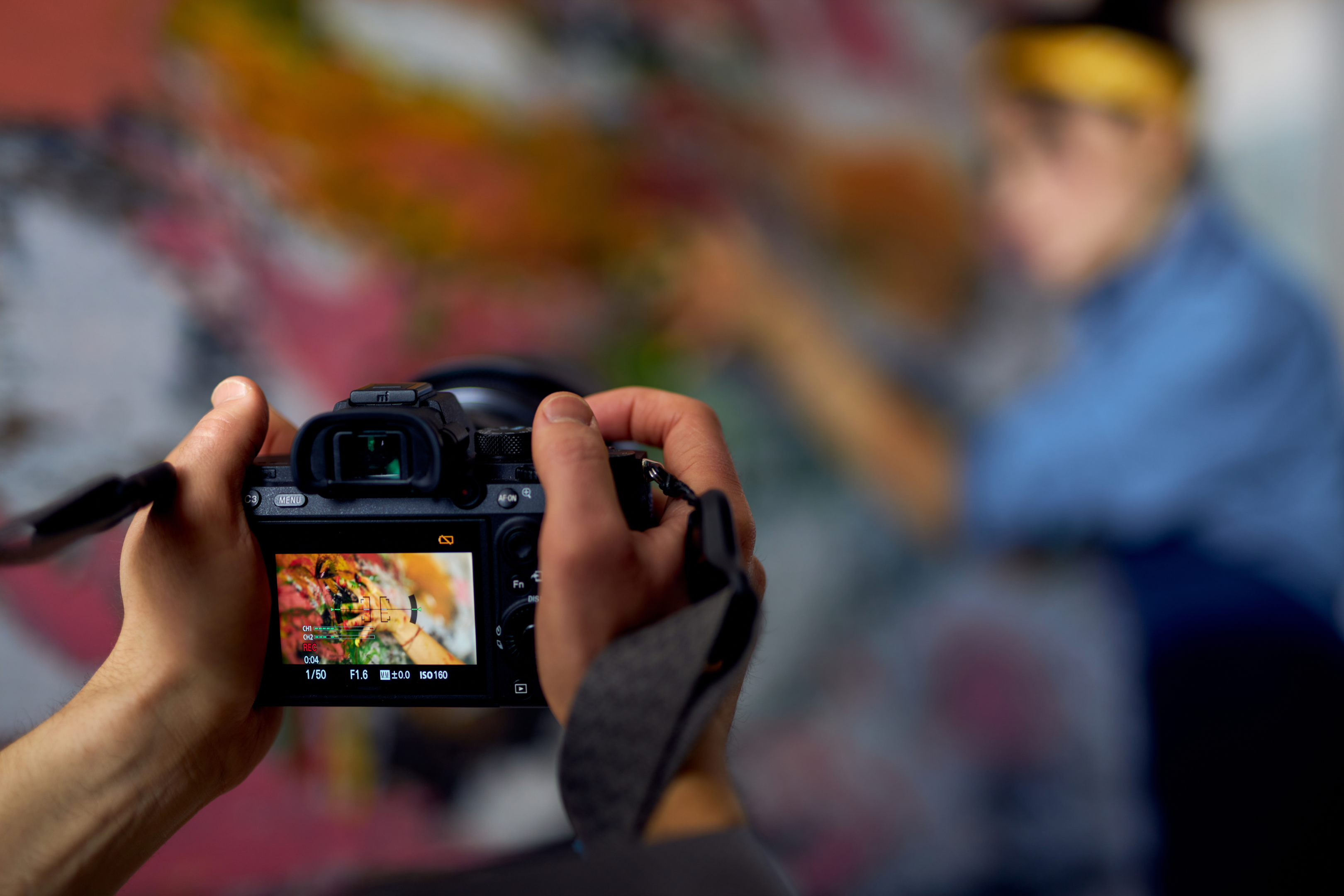 man handling a camera