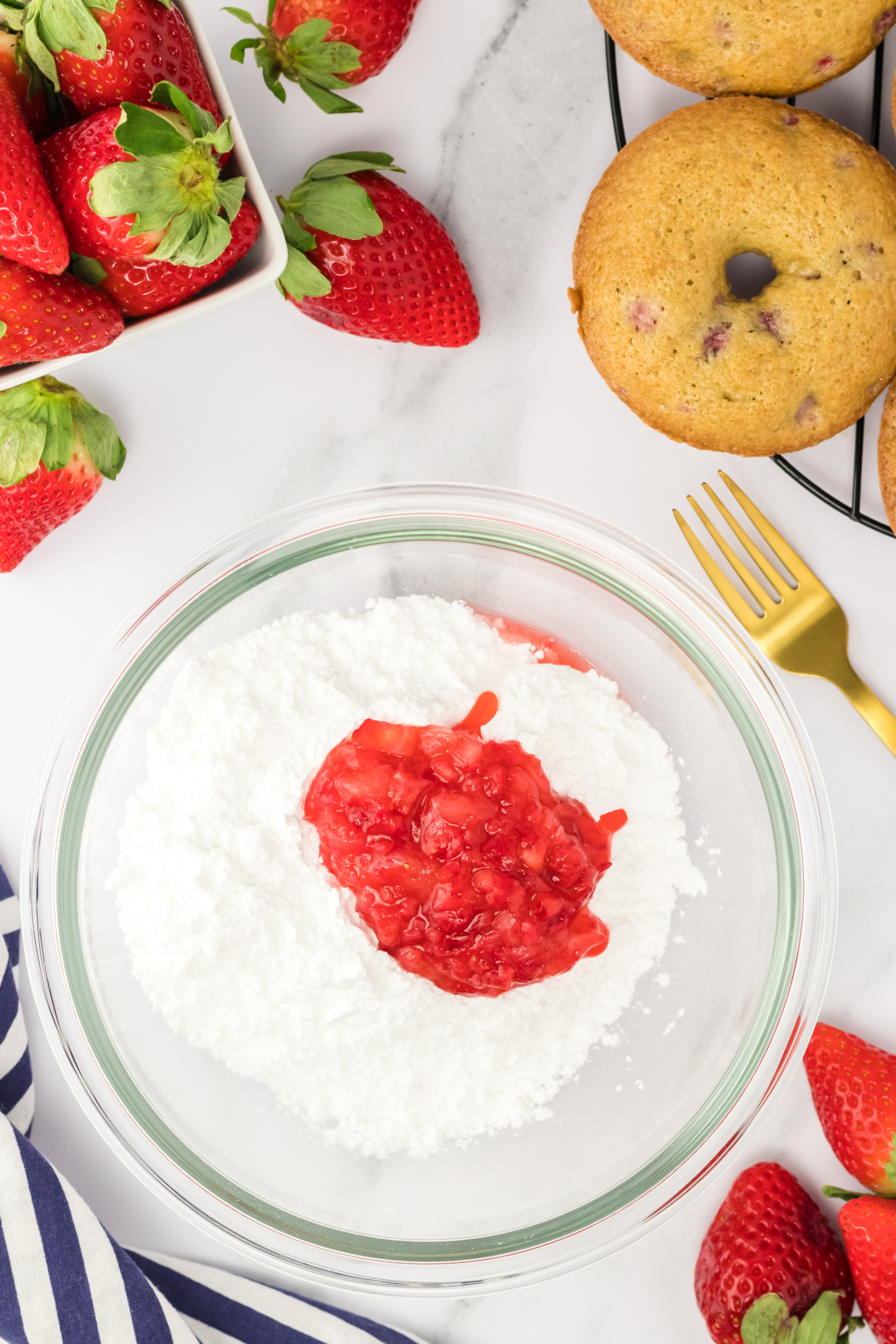strawberry puree added to powdered sugar