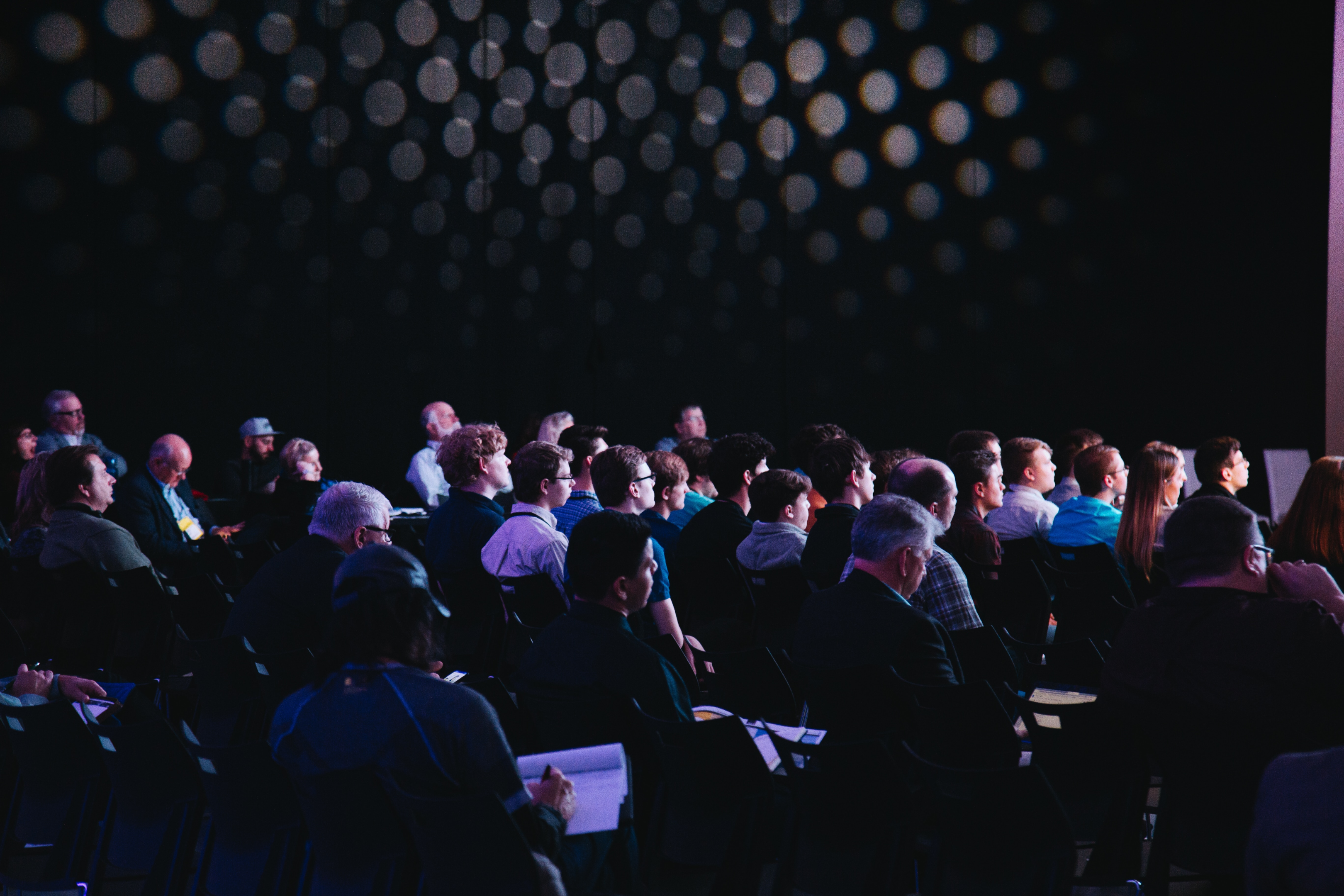 an audience at a professional keynote learning event