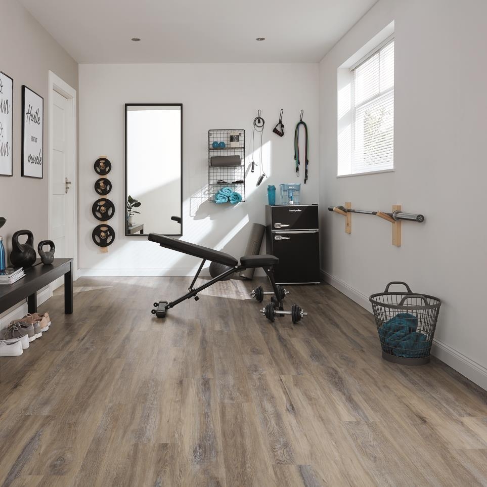 Luxury vinyl plank flooring in small gym