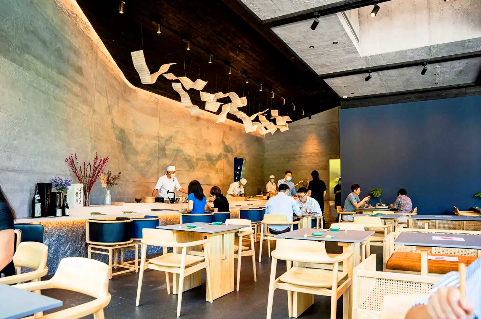 Ganko Sushi Singapore Japanese restaurant interior with open sushi counter, contemporary dining space and traditional Japanese design