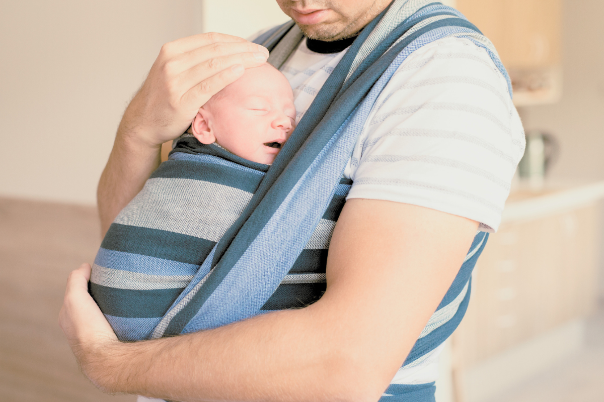 dad wearing baby