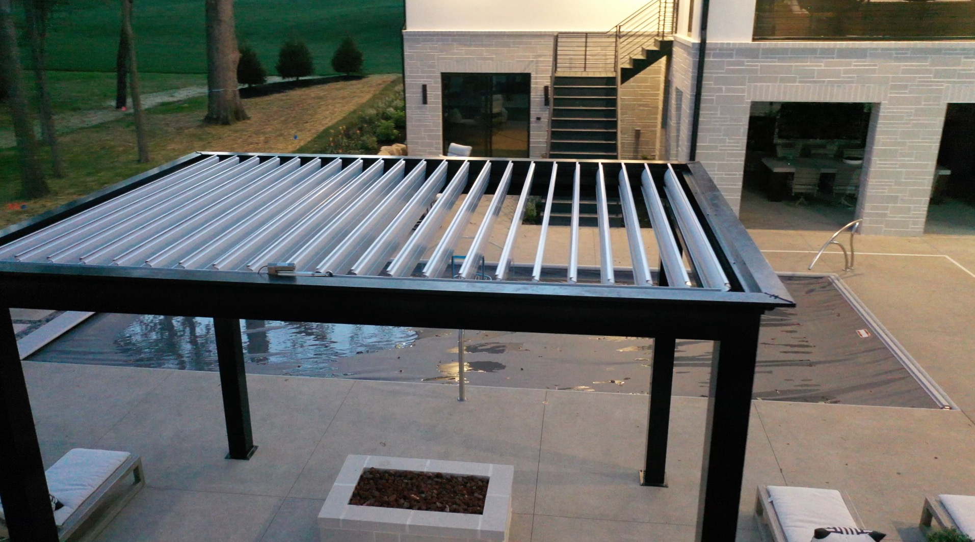 An Aluminum Pergola Next To Pool