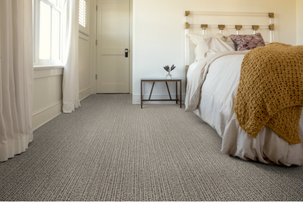 gray patterned carpet in bedroom