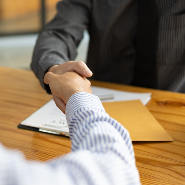 Image showing a personal injury attorney negotiating with insurance representatives.