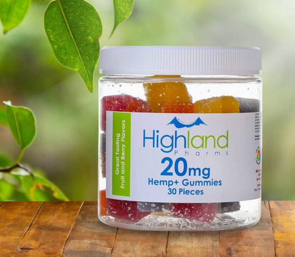 A bottle of 10mg CBD gummies with a label showing full spectrum hemp extract