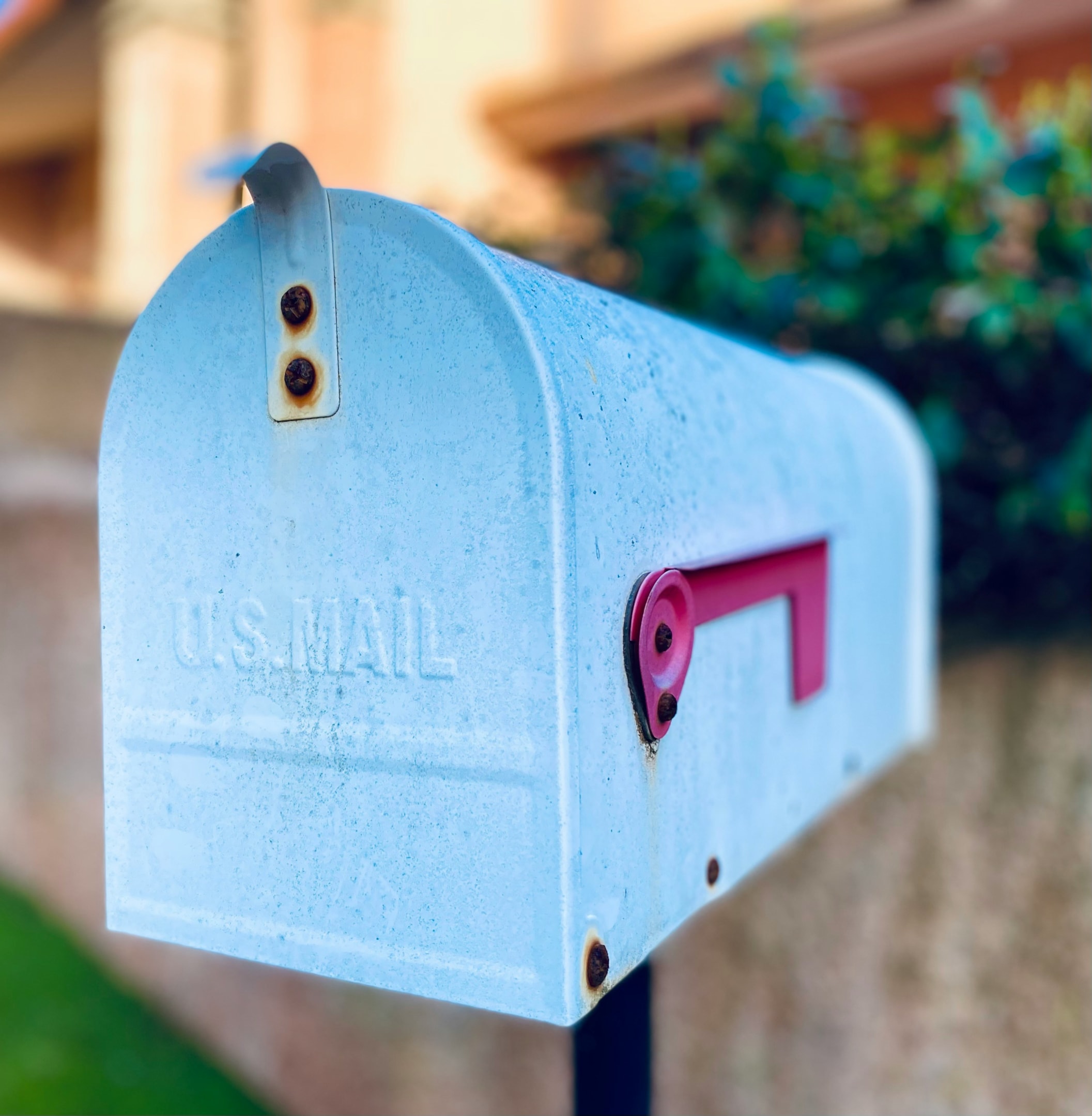Mailbox in front of house being targeted by real estate investor as part of an A/B testing campaign. 