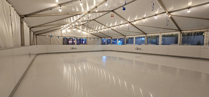 Ice rink with people ice skating