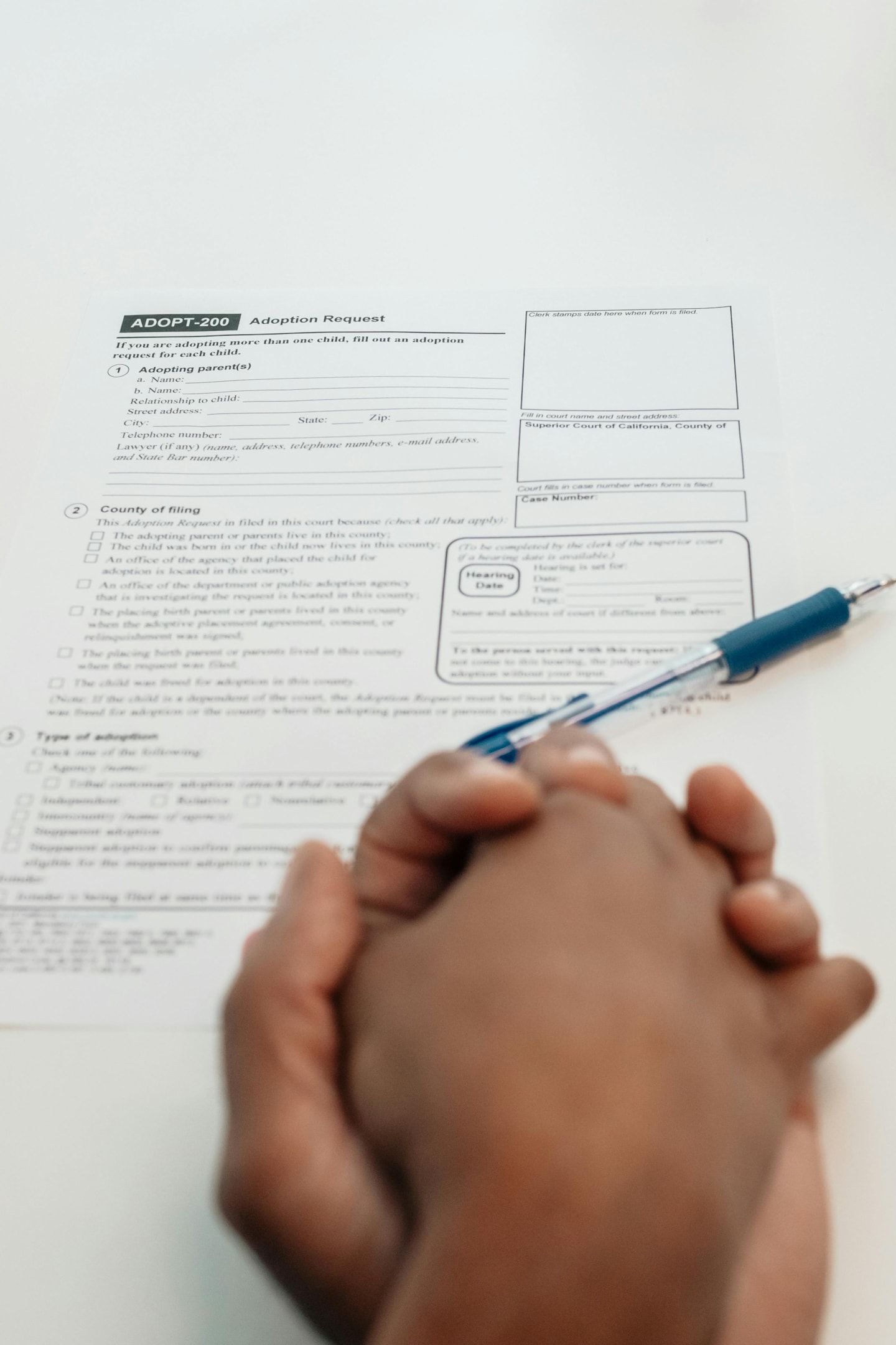 Couple signing rental agreement for property. 