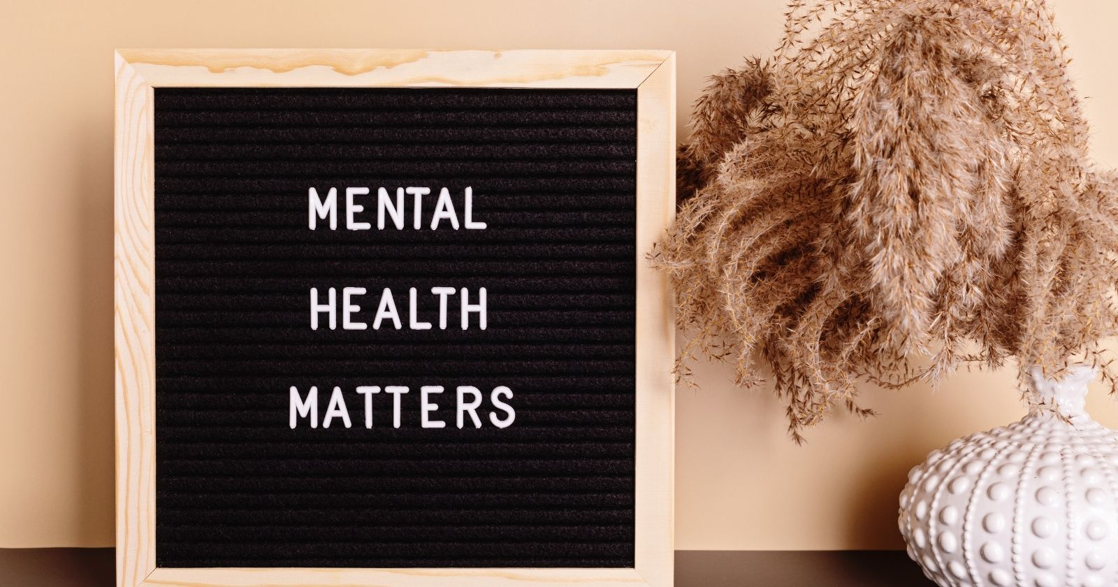 Mental Health and Addiction
Table piece and black board with a text "Mental Health Matters"