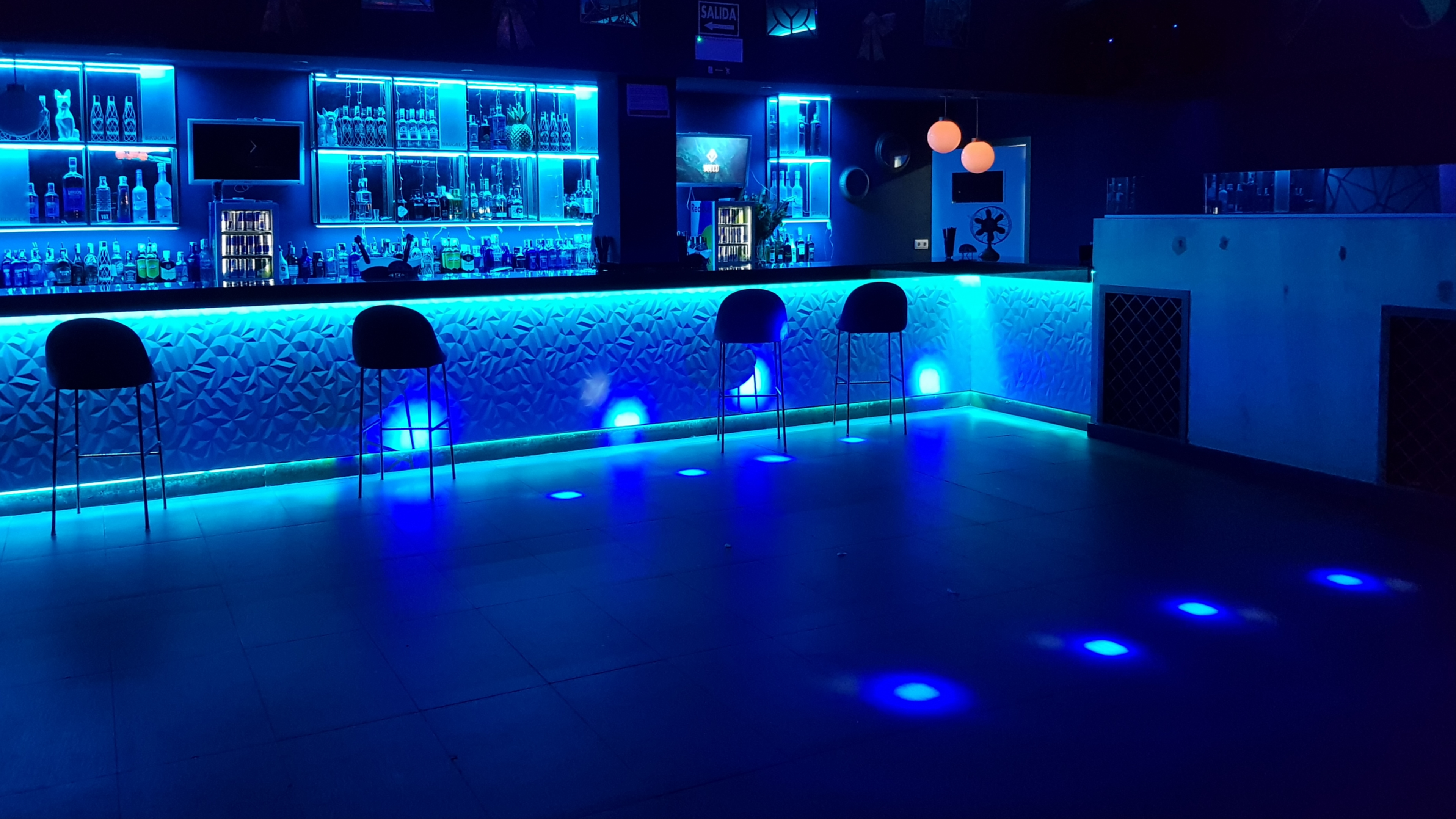 Downlighting with Blue Spotlights in a Bar
