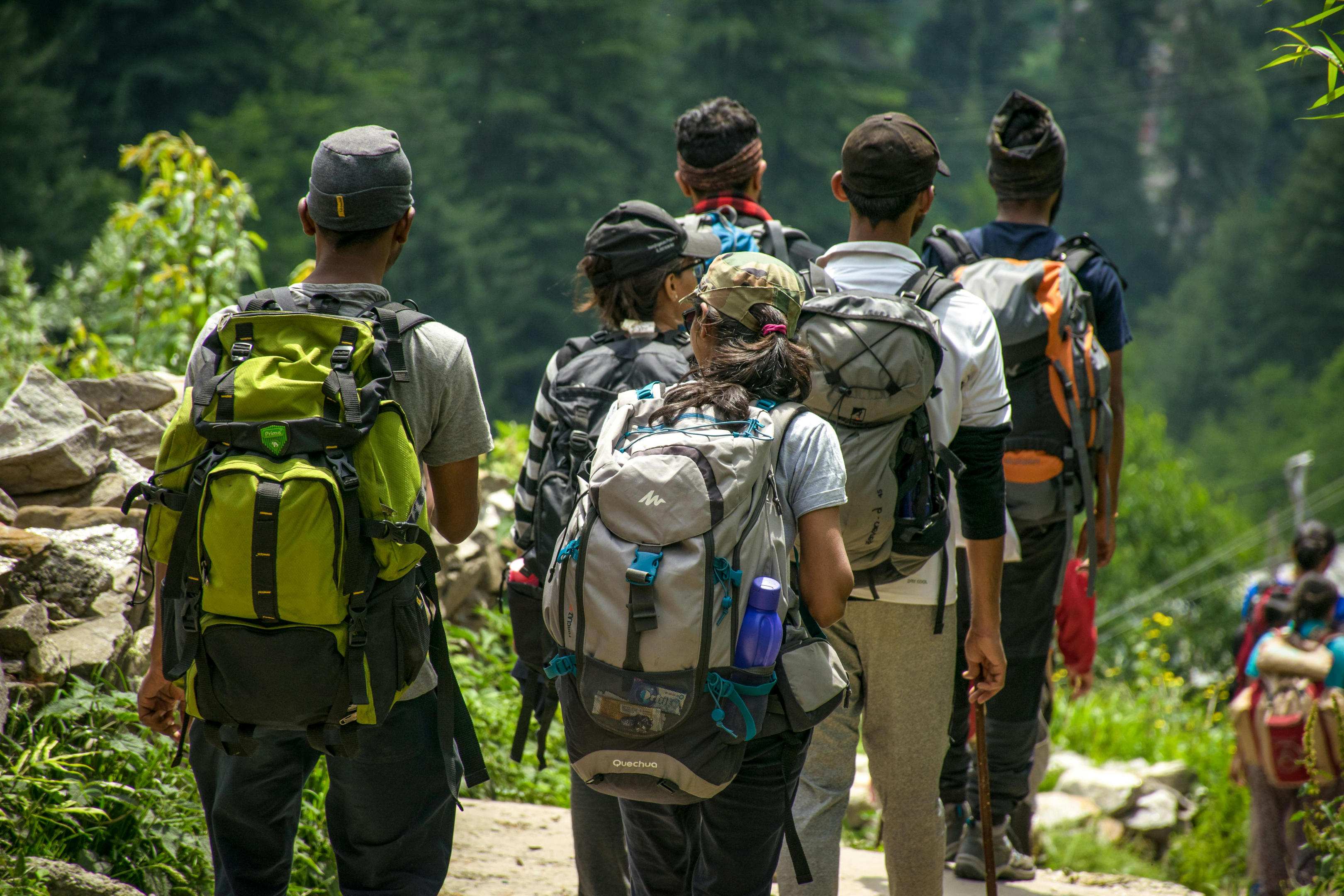 Photo by Guduru Ajay bhargav: https://www.pexels.com/photo/people-walking-on-road-near-trees-at-daytime-photo-1076081/