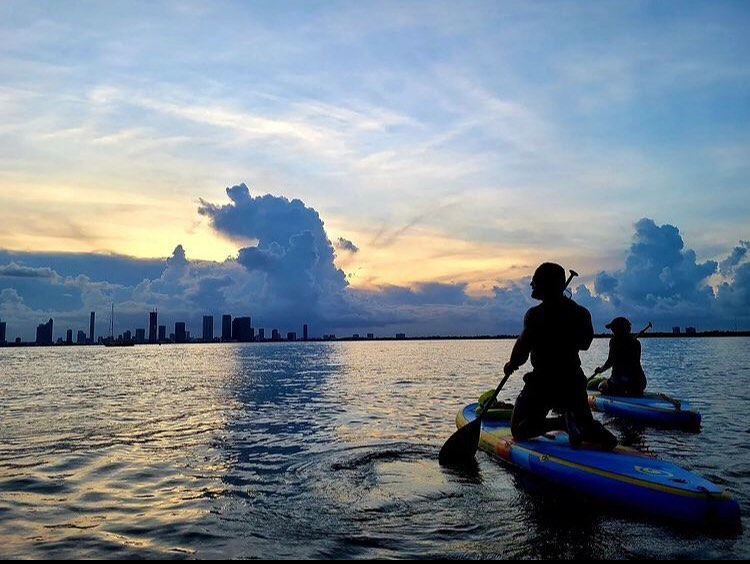 paddle boarding at night