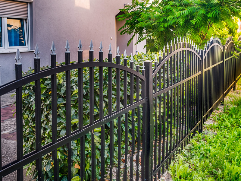 An image showing a newly installed fence marking clear property boundaries in a residential area.