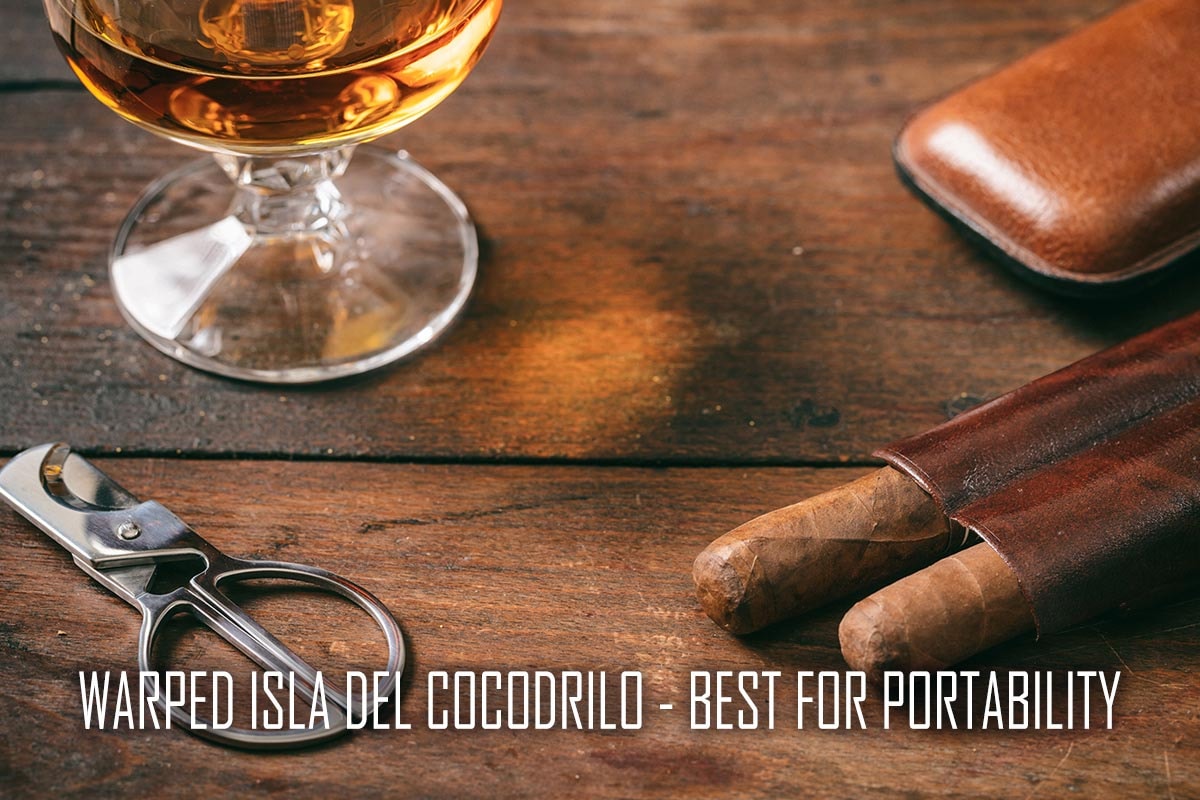 An illustration of portable cigar accessories alongside Warped Isla del Cocodrilo cigars, emphasizing convenience.