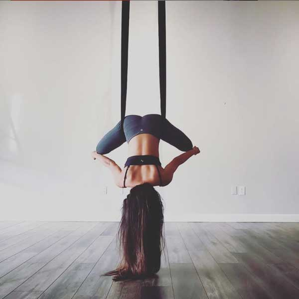 aerial yoga teaching methodology and physical practice from yoga alliance certified yoga teacher