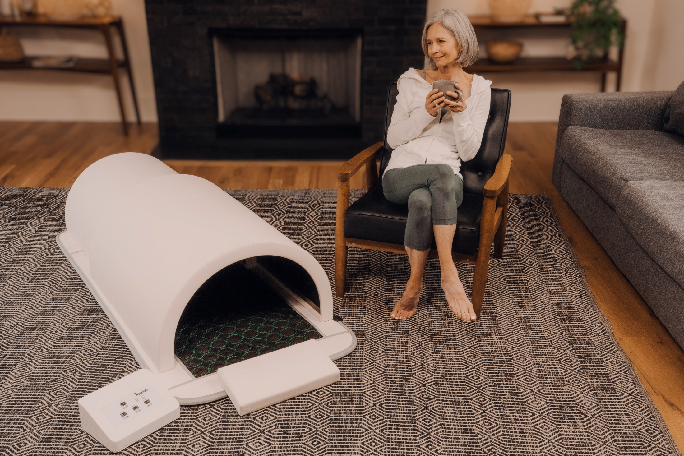 A person relaxing in a portable sauna