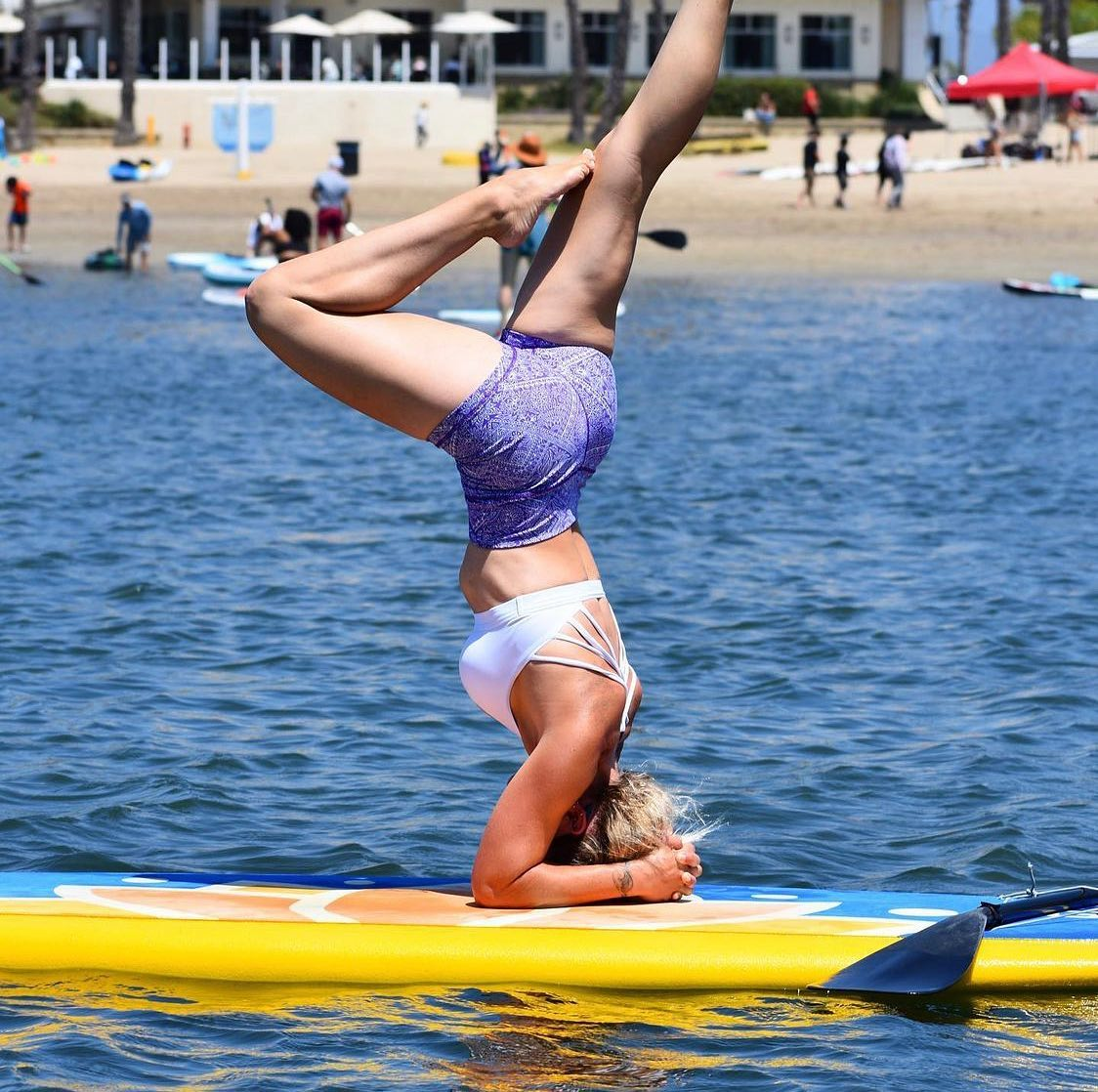 fiberglass paddle holder for yoga session on sup boards