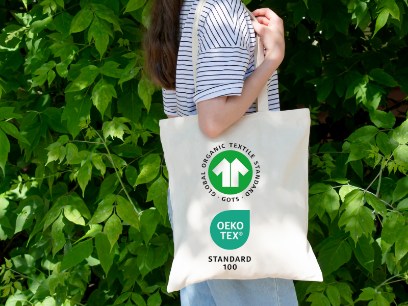 An illustration of a girls carrying a certified tote bag