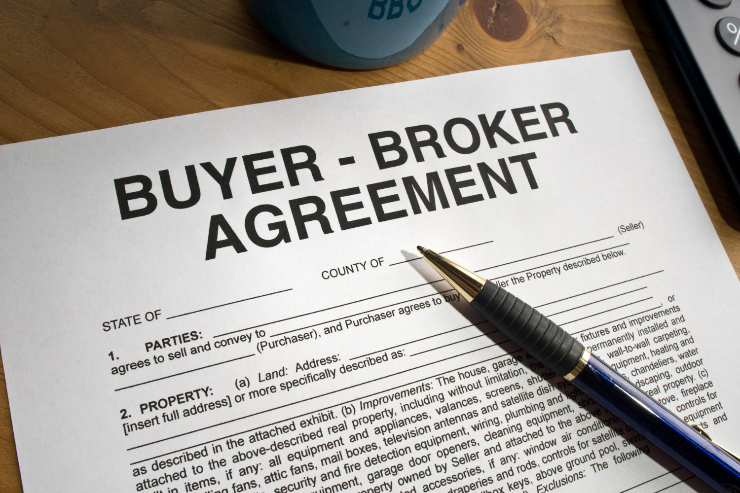 A close-up of a business contract labeled “Broker Agreement.”